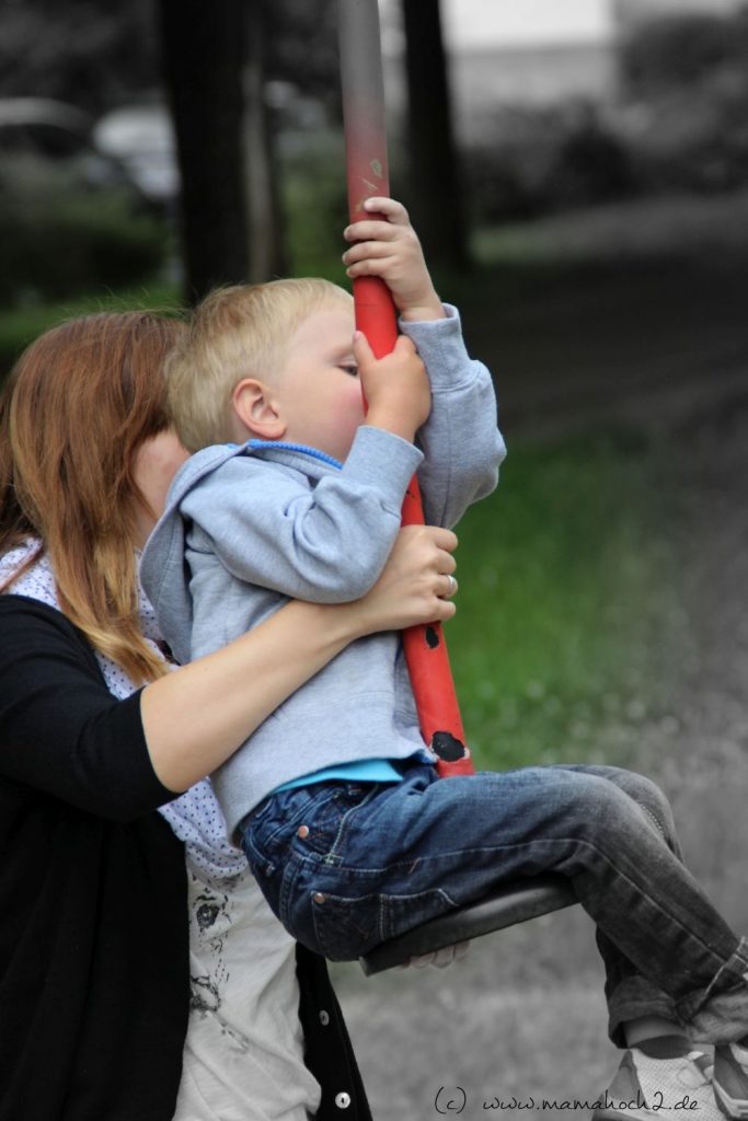 Mutter mit Kind Spielplatz